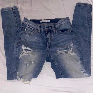 Mid Rise Faded Ripped/Distressed Light Wash Jeggings